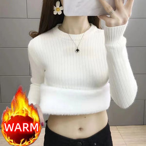 a girl wearing a white fleece sweater