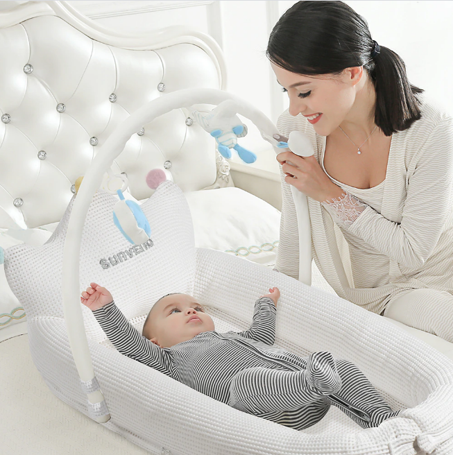 Portable Baby Crib With Mobile Attachment