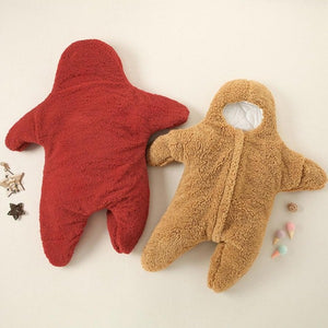 2 pieces of Baby Star Costume | Winter One Piece lying flat on a white surface. One is red and the second one is light brown. the red one  is presenting the back part of the Baby Star Costume | Winter One Piece highlighting that it is soft and has no additional decor which might make your baby feel bad when lying on her back. the light brown Baby Star Costume | Winter One Piece is presenting the front look.