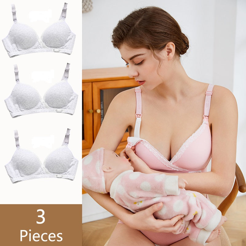 a beautiful young mom is going to nurse her baby, she's unsnapping her nursing bra using her left hand and holding her baby in her right arm. the nursing bra is sold in pack of 3, color gray