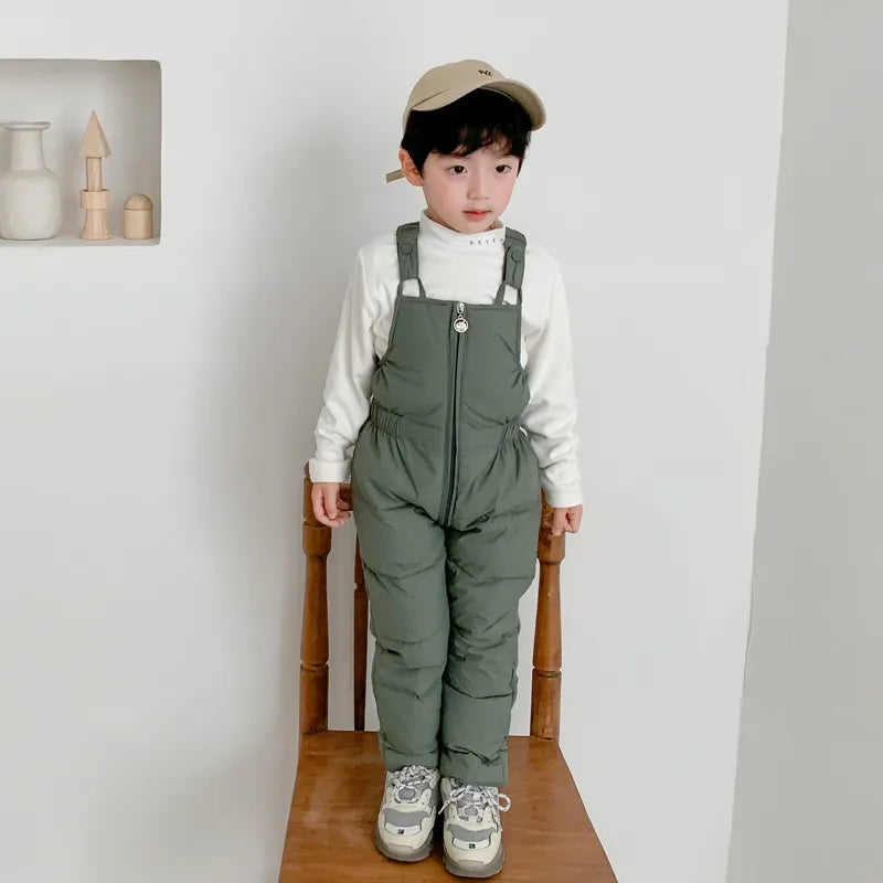 a cute 5 year old boy wearing Winter Clothing for Toddlers in grayish-green color