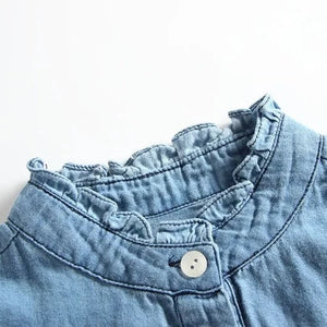 the picture is taking a close look at stand collar of our brand new Denim Cowgirl Dress for 6-7 year old girls