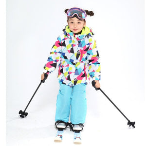 an 8 year old girl going skiing wearing her brand new ski jacket and pants set