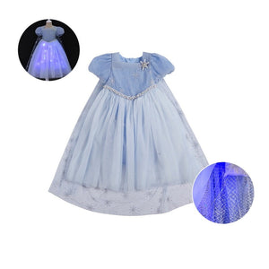 the pictue presents what the Light Up Princess Dress looks like during the day with no lights on and in thedark wit the ligts on