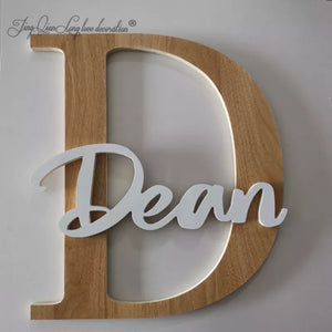 Custom Made Wooden Name Sign For Kids Room Decor feaaturing capital letter D and italics name Dean