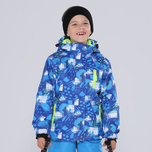 a happy 9 year old boy wearing a ski jacket and pants set