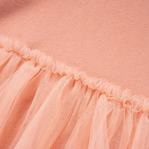 this picture is taking a closer look at elastic waistline of toddler girl dresses color pink