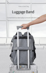  On-the-go diaper backpack to put on a suitcase