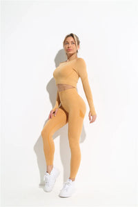 this picture is showing a beautiful young woman with gorgeous figure wearing a yoga suit color light yellow. the yoga suit set consists of 2 tems: a pasta top and a pair of pants with high waist to flatten your belly and butt push up effect. side view