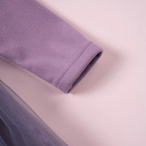 this picture is taking a closer look at long sleeve cuff of toddler girl dresses color purple
