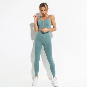 this picture is showing a beautiful young woman with gorgeous figure wearing a yoga suit color light green. the yoga suit set consists of a pasta top and a pair of pants with high waist to flatten your belly and butt push up effect.
