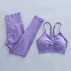 this picture is showing a color light purple yoga suit set consisting of 2 tems: a pasta top and a pair of pants with high waist to flatten your belly and butt push up effect.