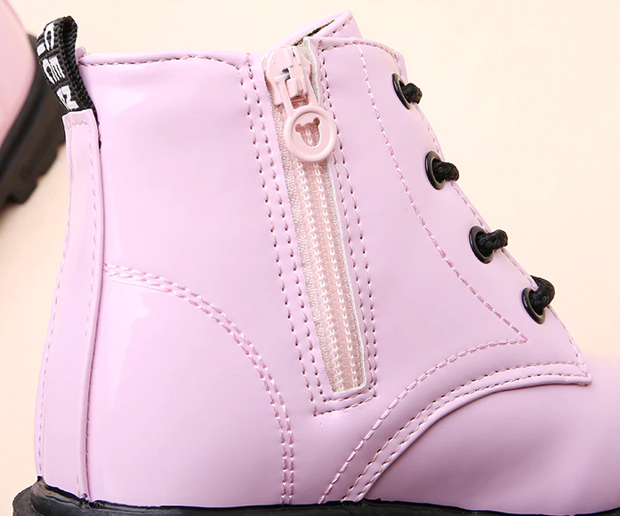 side view of pink ankle boots with zipper and lace