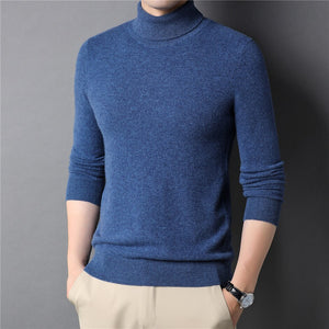handsom young model wearing a blue merino wool turtleneck 