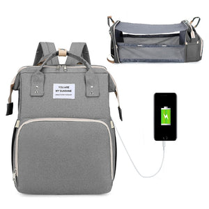 Diaper Bag Backpack with usb output transforms into a changing mat colour gray