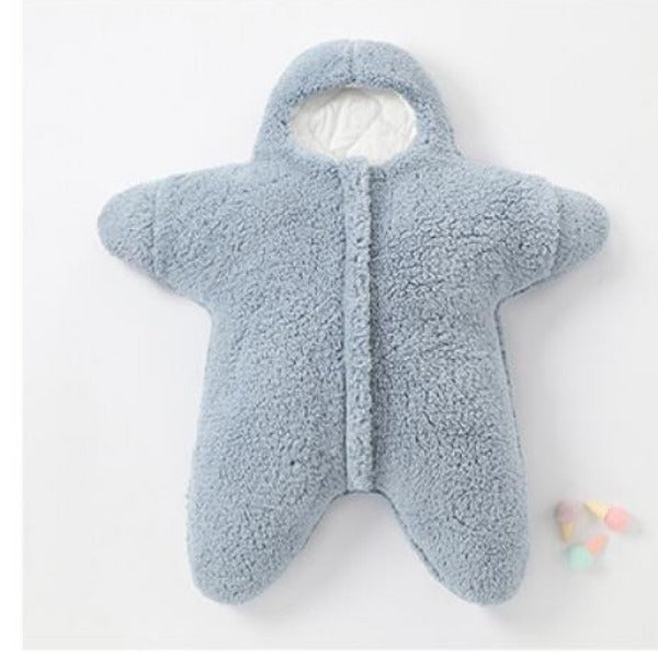 light blue Baby Star Costume | Winter One Piece lying flat on a white surface