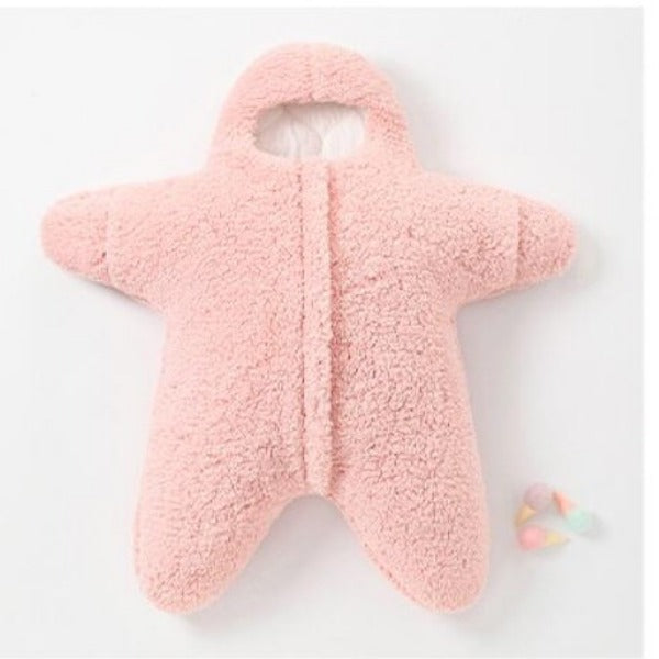 light pink Baby Star Costume | Winter One Piece lying flat on a white surface