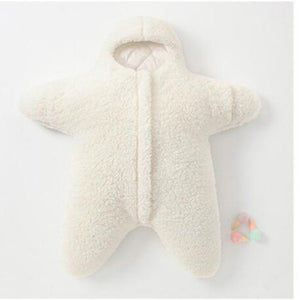 white Baby Star Costume | Winter One Piece lying flat on a white surface