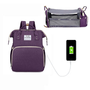 Diaper Bag Backpack with usb output transforms into a changing mat colour purple