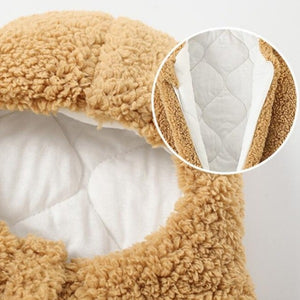 this picture is showing a closer look at the Baby Star Costume | Winter One Piece highlighting its warm and cosy white cotton inner layer