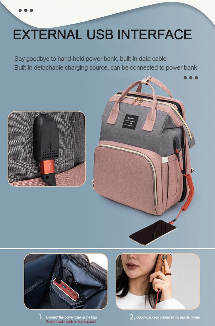 Diaper Bag Backpack has a special place to store power bank and charge phone