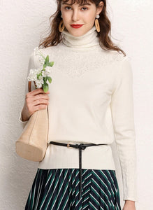 a beatiful young woman wearing cashemere turtleneck sweater color white with a midi skirt