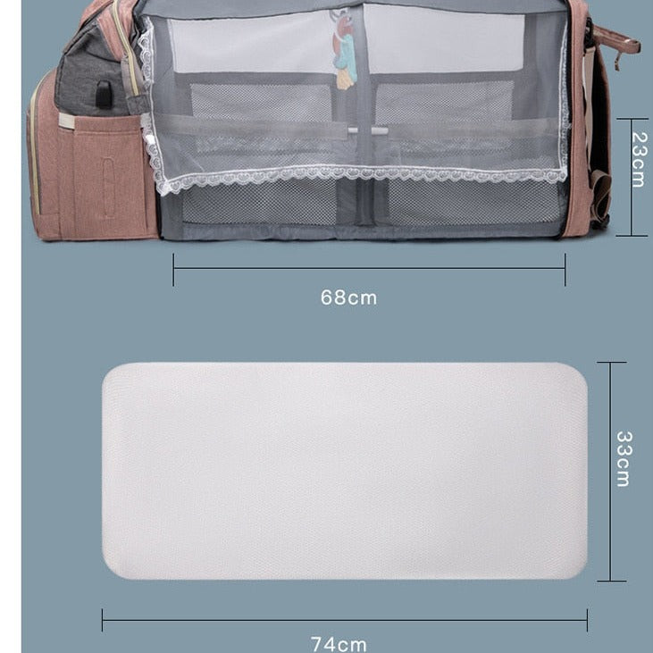 diaper bag backpack expands into 30'' baby changing mat