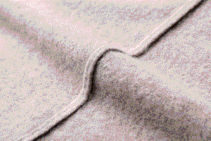 detailed view of how neat is the side seam of merino turtleneck sweater