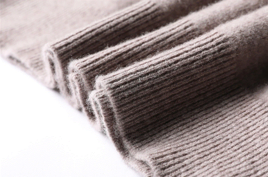 detailed view of elastic waist of men's wool turtleneck sweaters 