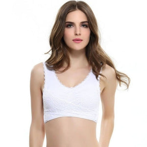 a slim young woman wearing a white wireless cross lace bra