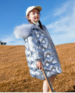 a 12 year old girl wearing Down Jacket Long silver color with metallic shine
