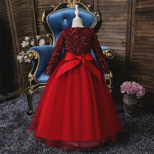 back view of a gorgeous scarlet flower girl dress with an elegant  satin bow